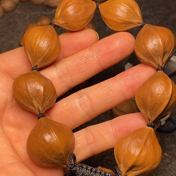 橄榄核手串2.4四花10号