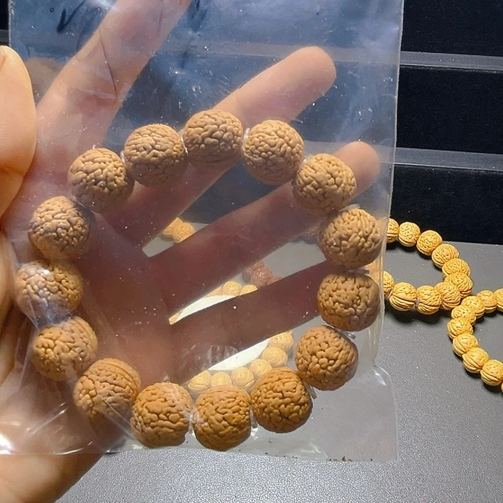 宇***少桃核吊坠桃核手串