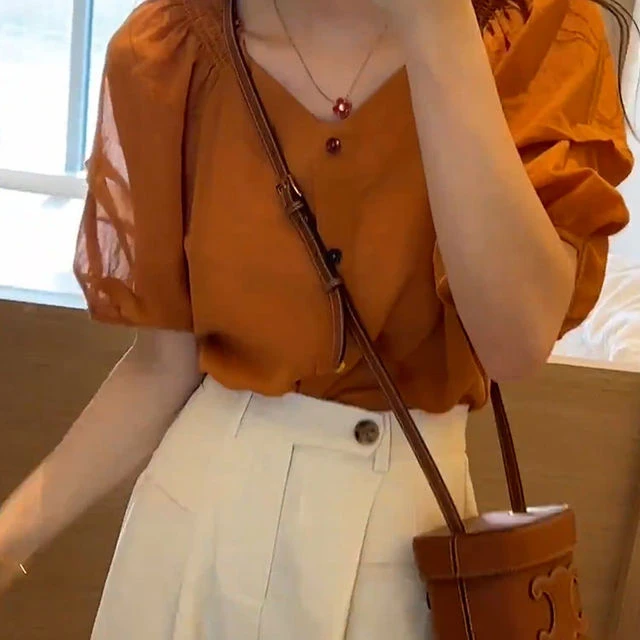 夏季新款彩色纽扣设计短袖衬衣女气质宽松休闲泡泡袖显瘦百搭上衣