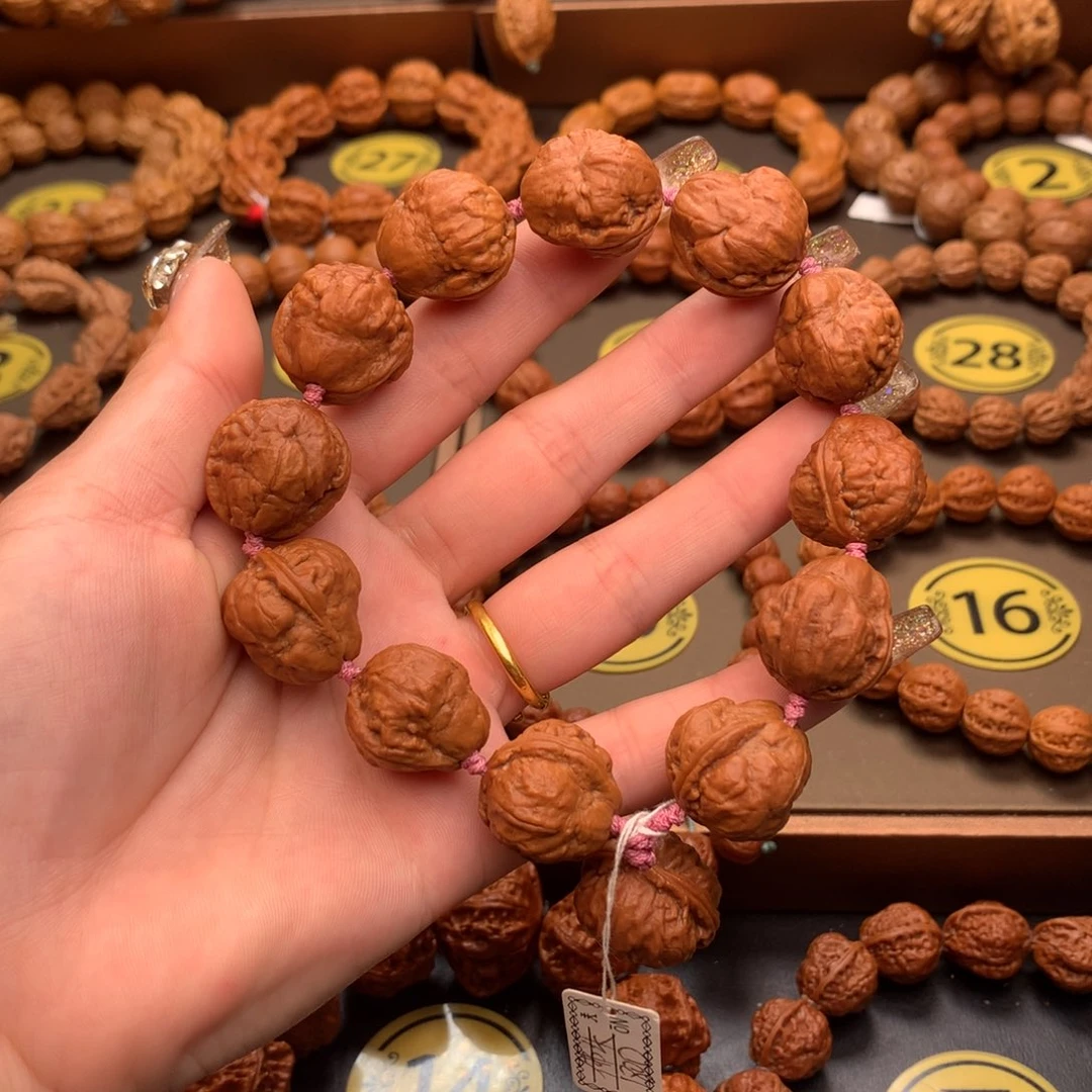 文玩核桃手串佛头
