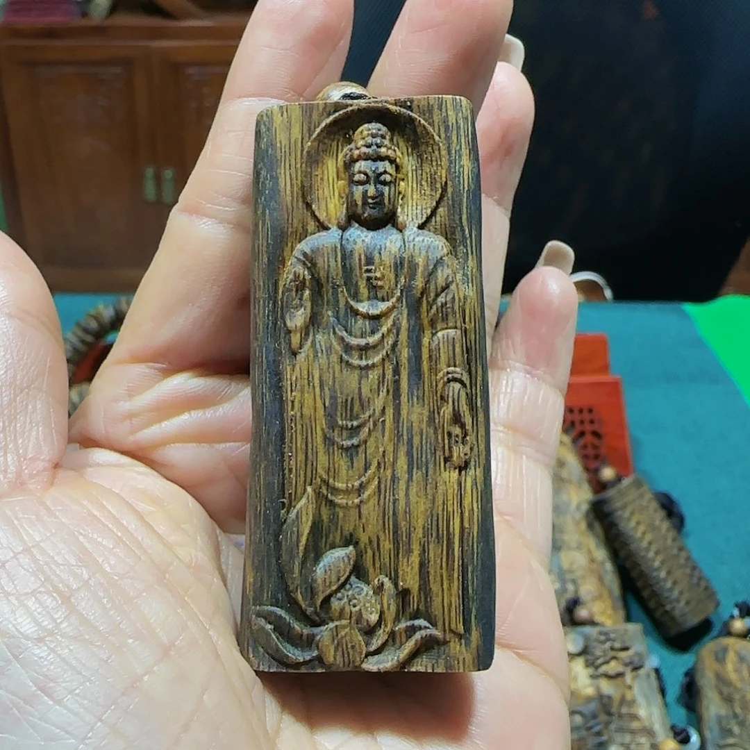 沉香吊坠海南白奇乌身树心油雕刻大日如来带绳19.9克