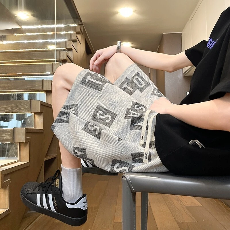 Mexican/稻草人夏季港风百搭男士宽松裤子透气薄款印花沙滩潮短裤