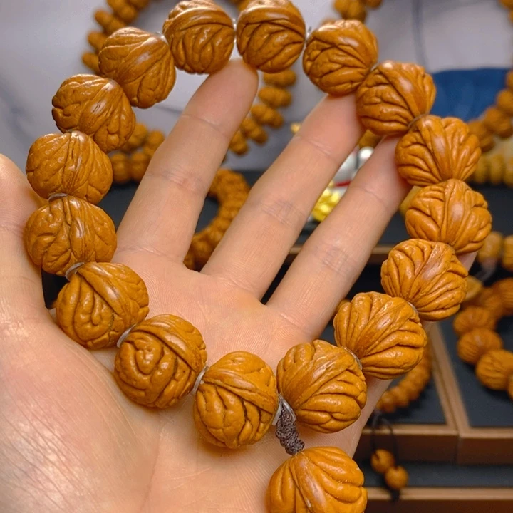 桃核吊坠霸王龙手持219