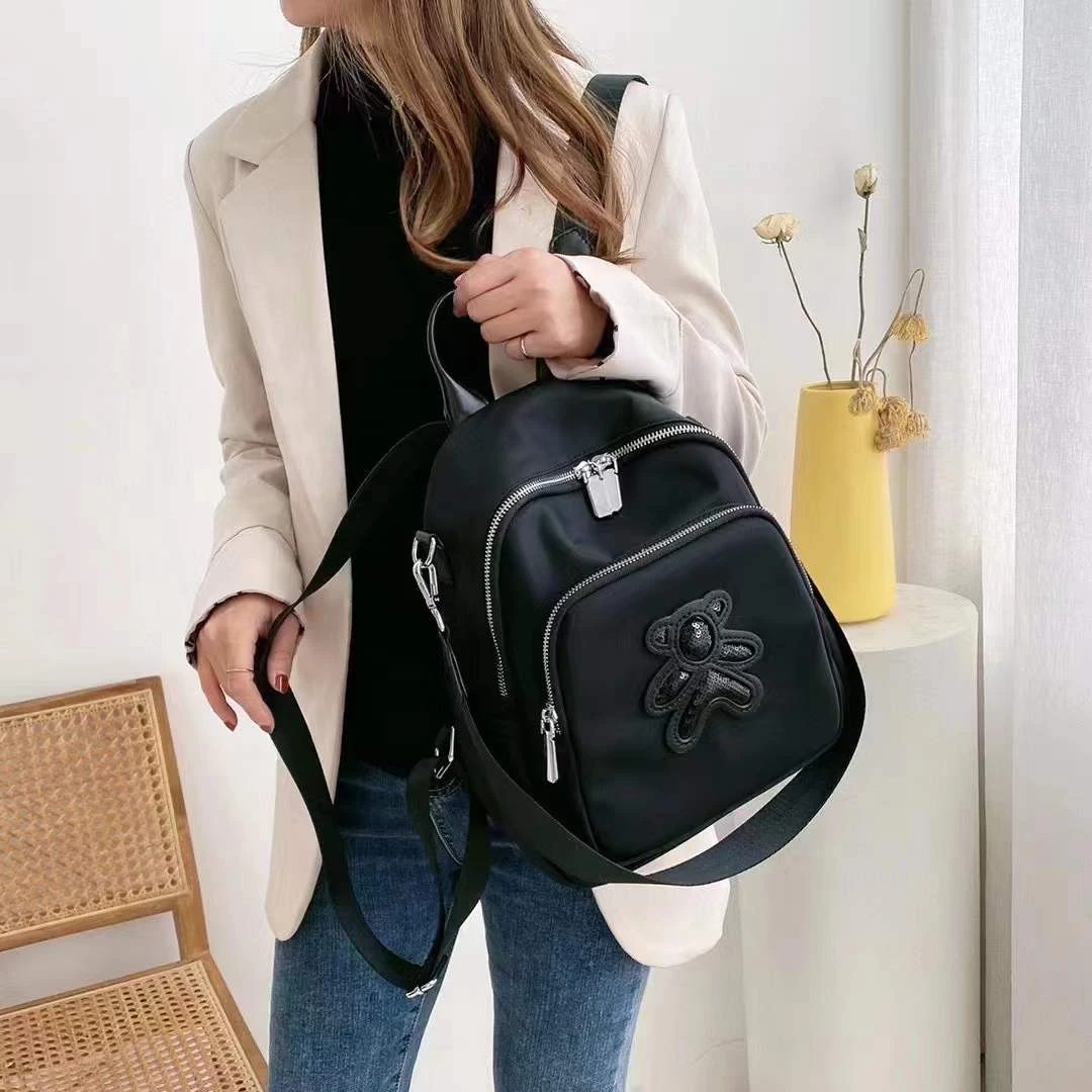 小熊双肩包可单肩布配牛皮的牛津布南韩丝面料防刮耐磨防泼水