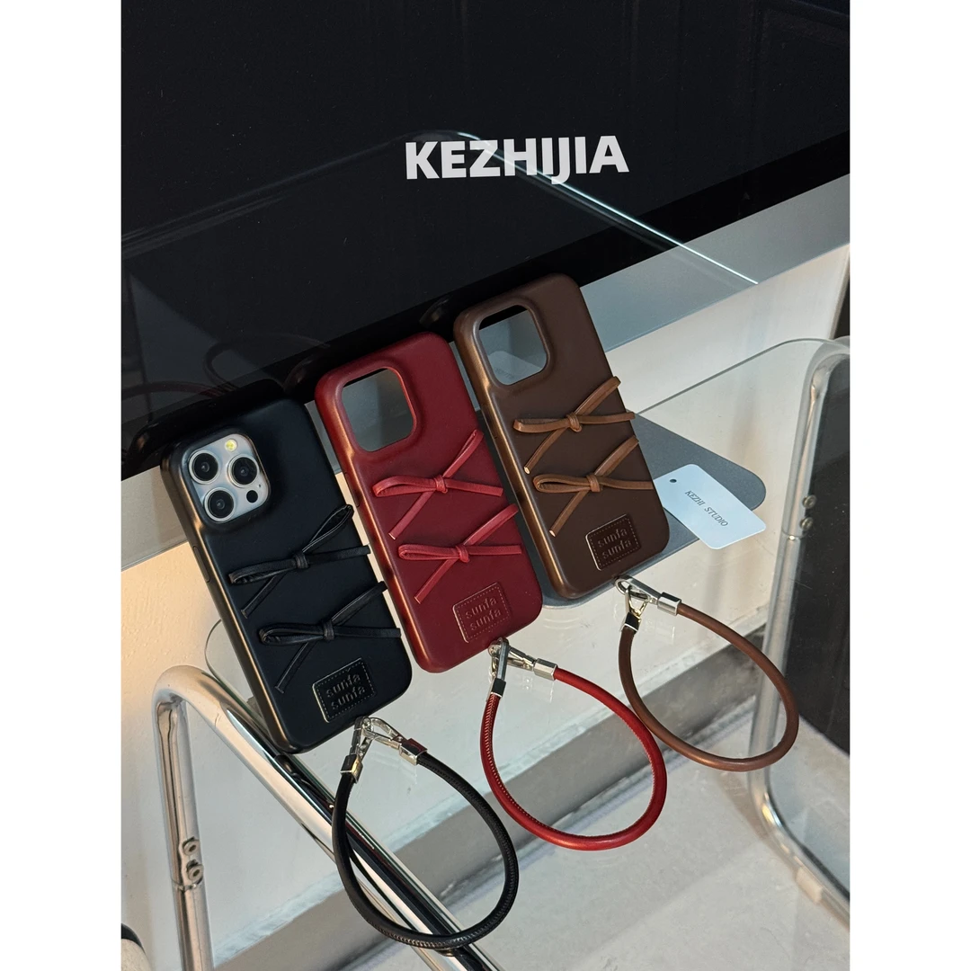 【壳之】ins皮质双蝴蝶结适用苹果16/15/14/13Promax高级防摔手机壳