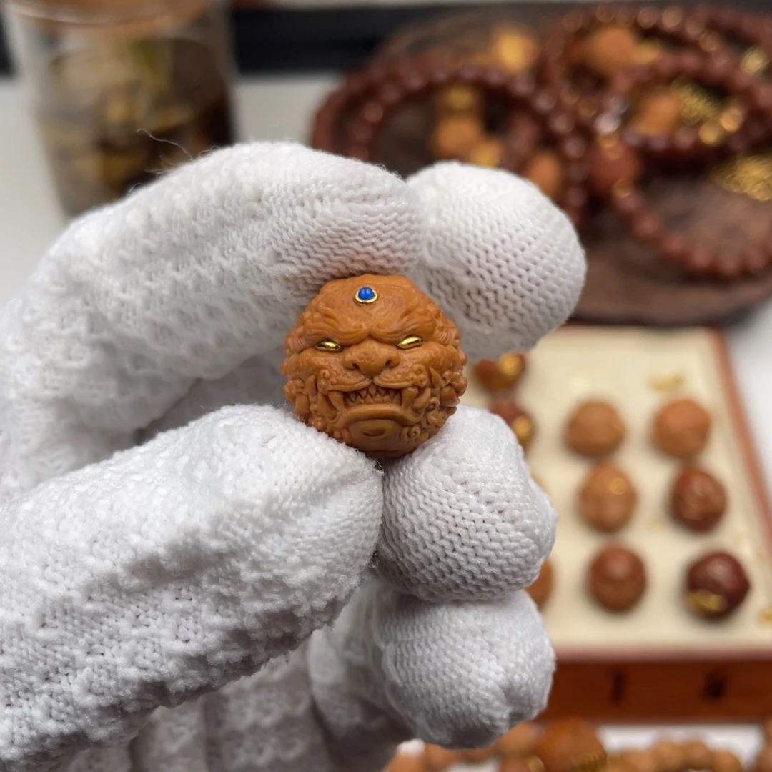 猴头核桃手串聂**?唐狮