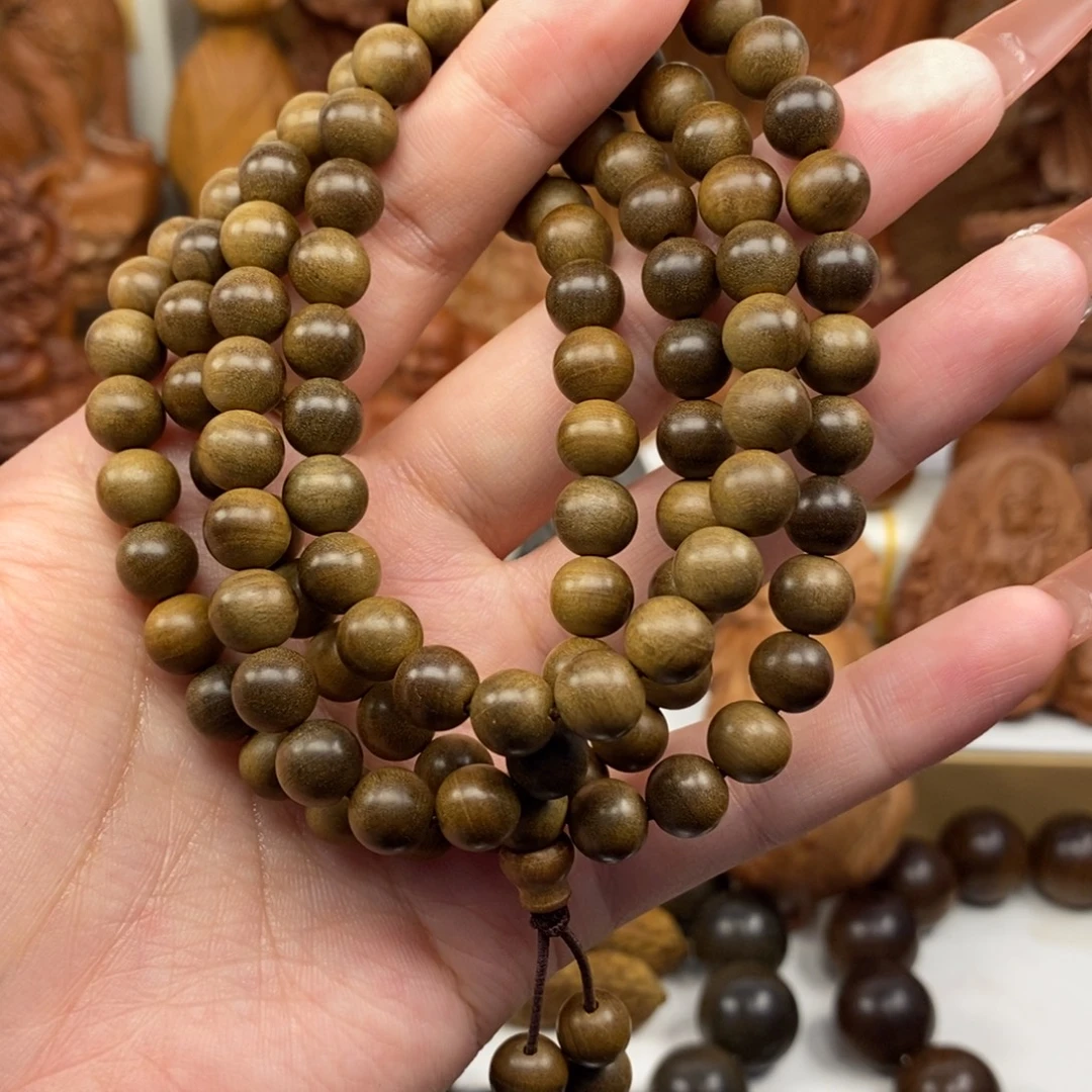 手串/手链檀香木迈索尔老山檀阴沉水埋08*108奶香，微微瑕