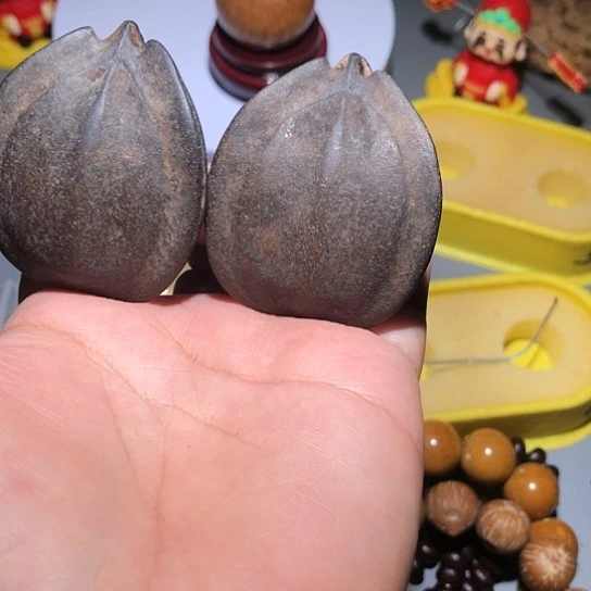 橄榄核把件练手地焖三角橄榄