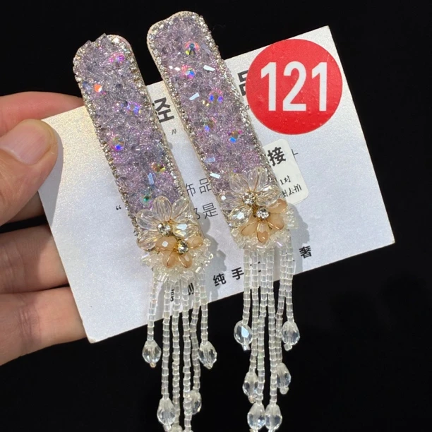 weixiang/薇香121原创高定流苏重工铃铛发夹掰掰夹