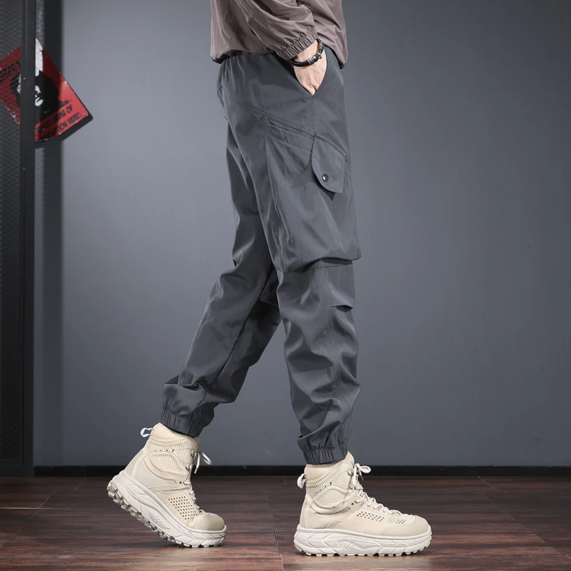 户外冲锋休闲裤男2025新款秋冬季机能束脚哈伦裤徒步战术工装裤潮