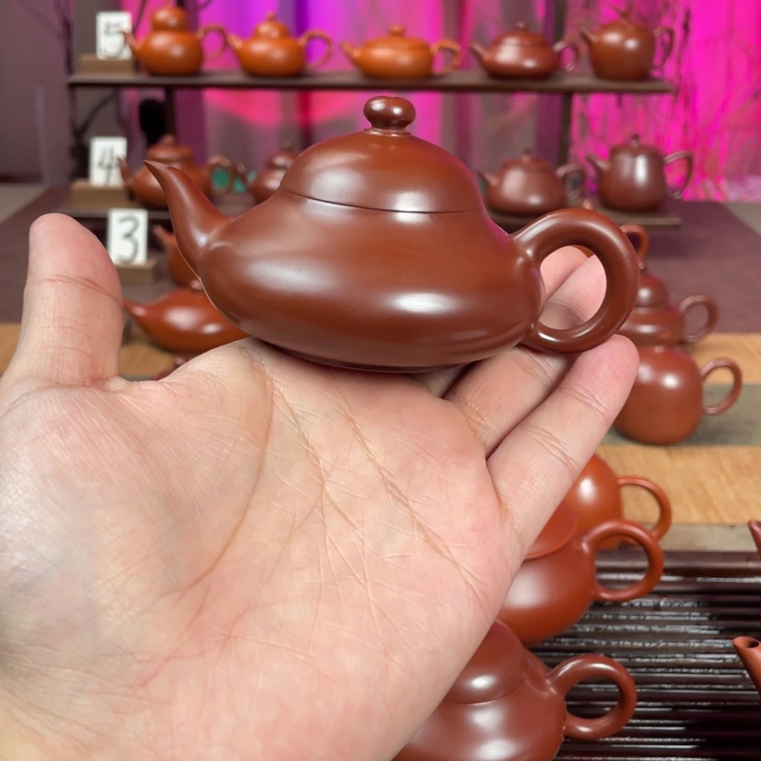 騛***茶壶紫砂精工梨壶100cc