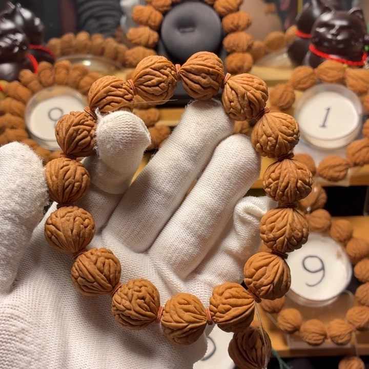 李***下桃核手串柳叶纹手串