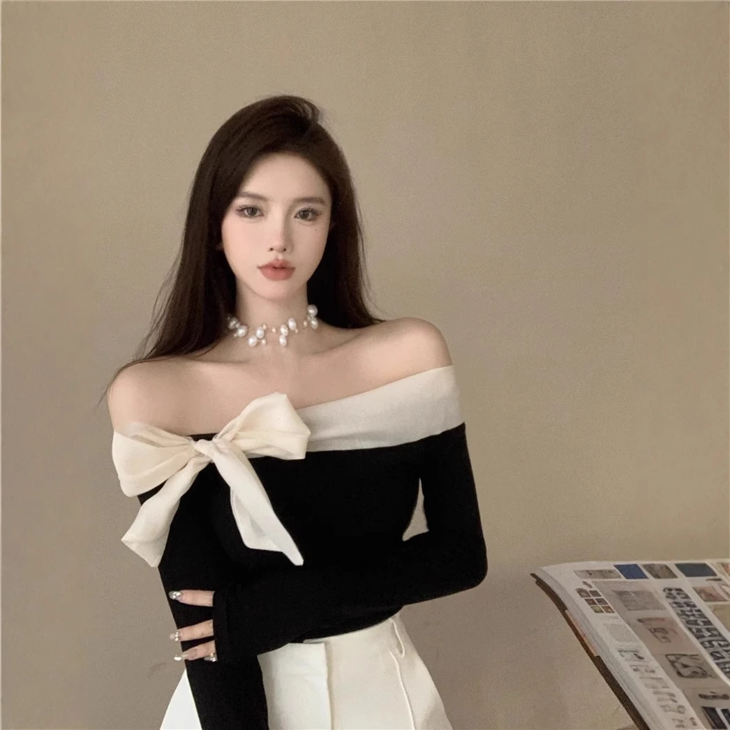 一字肩蝴蝶结长袖T恤女秋季温柔气质修身短款设计感撞色拼接上衣