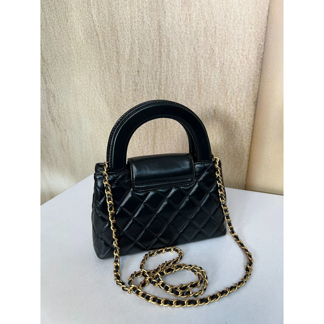 TOLEX2024新款手工油蜡一代半圆女包黑色