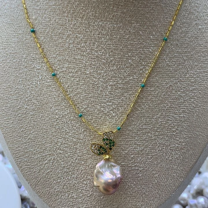 淡水珍珠耳饰银S925镶嵌滴*嗒