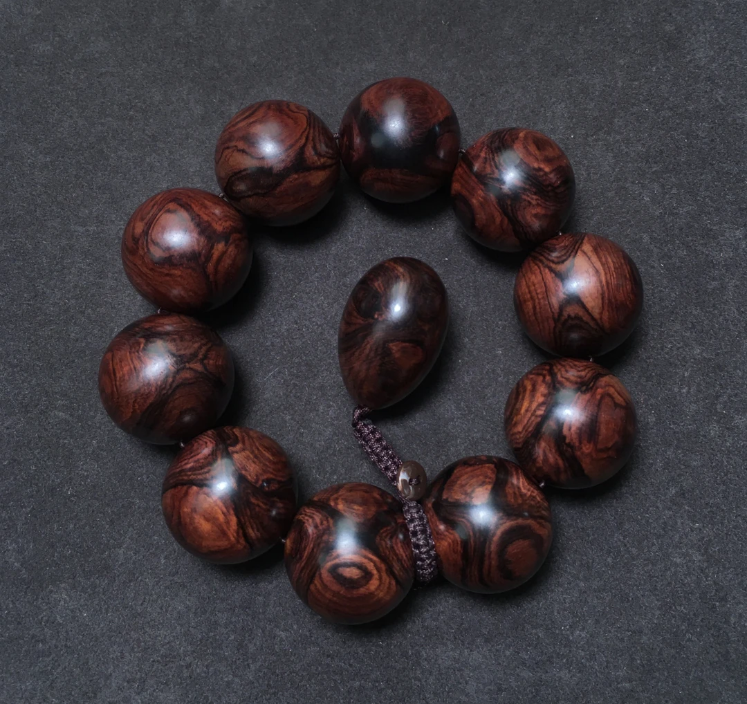 【浮生甄选】海南黄花梨油梨多彩2.5鬼脸对眼手串FS196