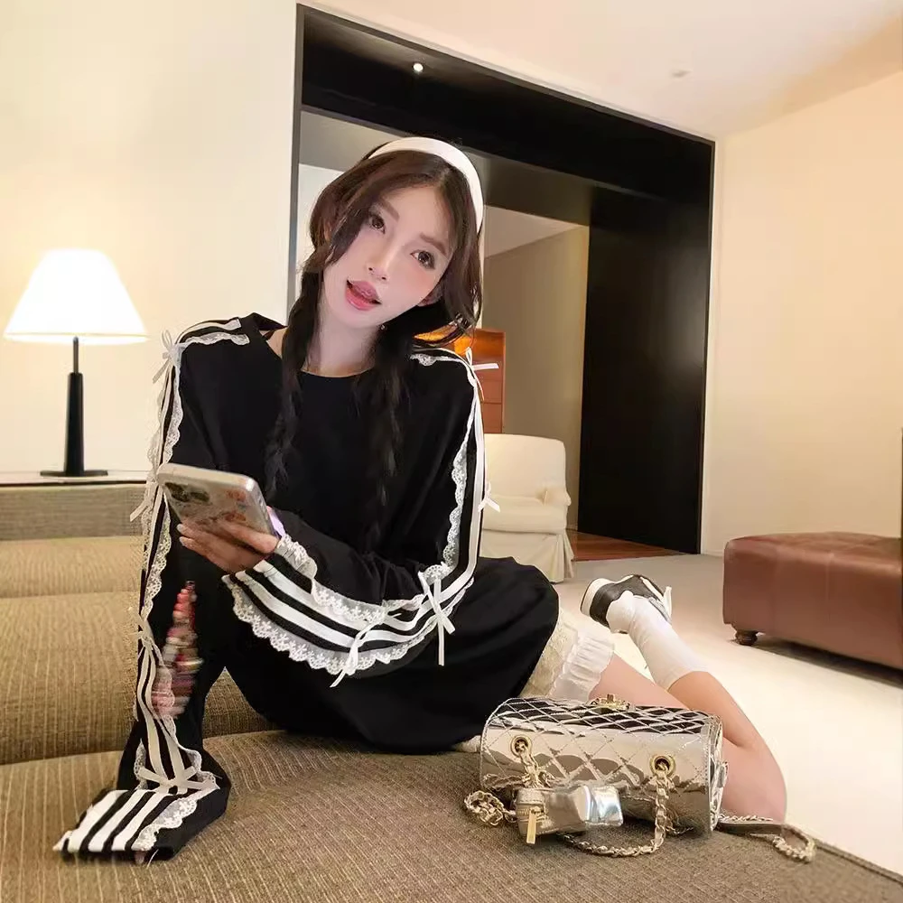 蝴蝶结黑色长袖宽松恤女装秋季蕾丝拼接韩版中长款圆领百搭上衣