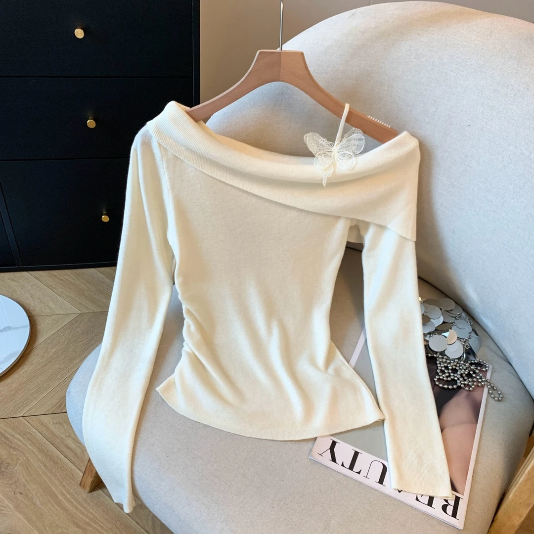 设计感洋气斜肩蝴蝶结上衣女春秋季气质褶皱显瘦长袖针织打底小衫