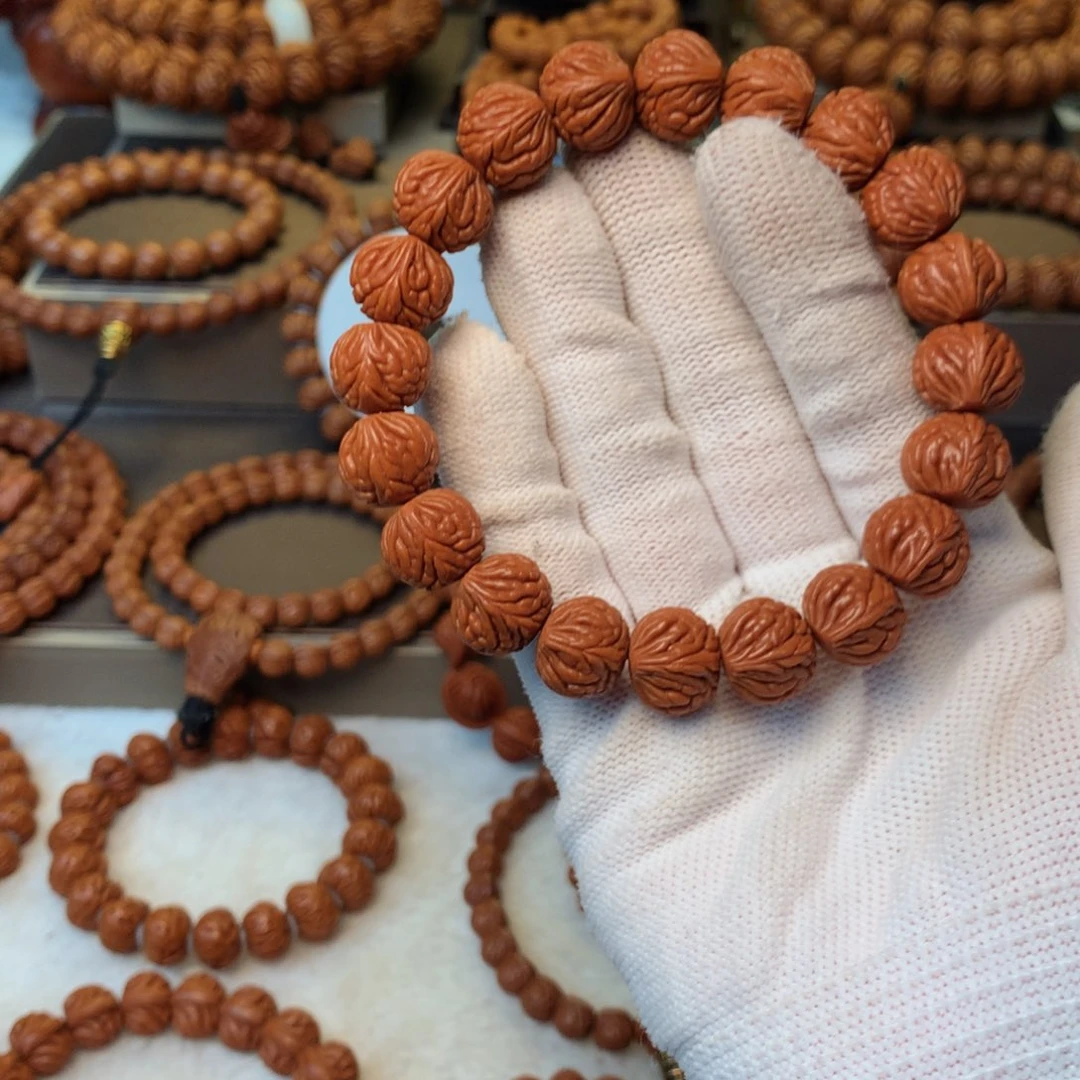 宇***。桃核手串秦岭龙纹