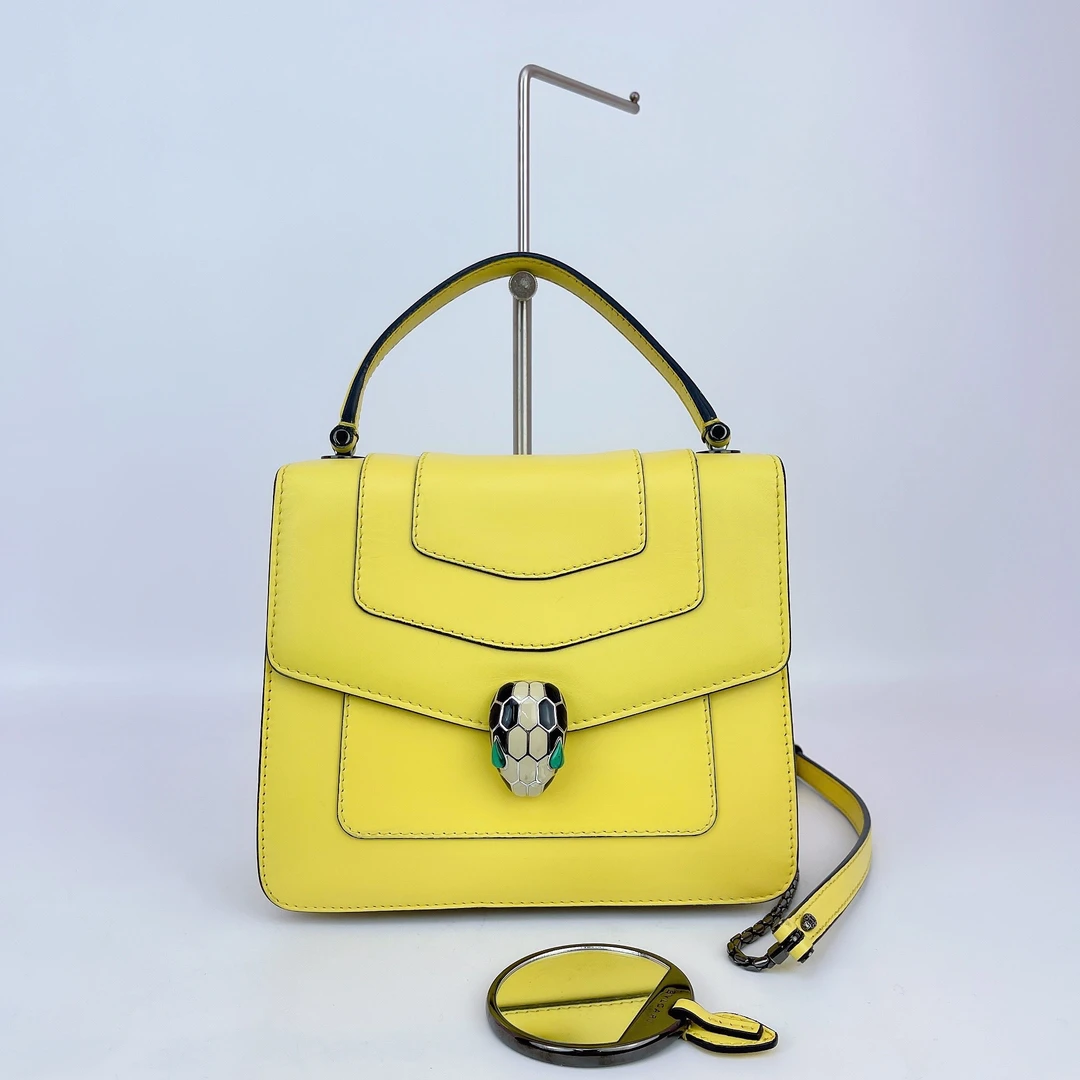 95新 BVLGARI/宝格丽 宝格丽 黄色牛皮风琴蛇头包底长20 E052