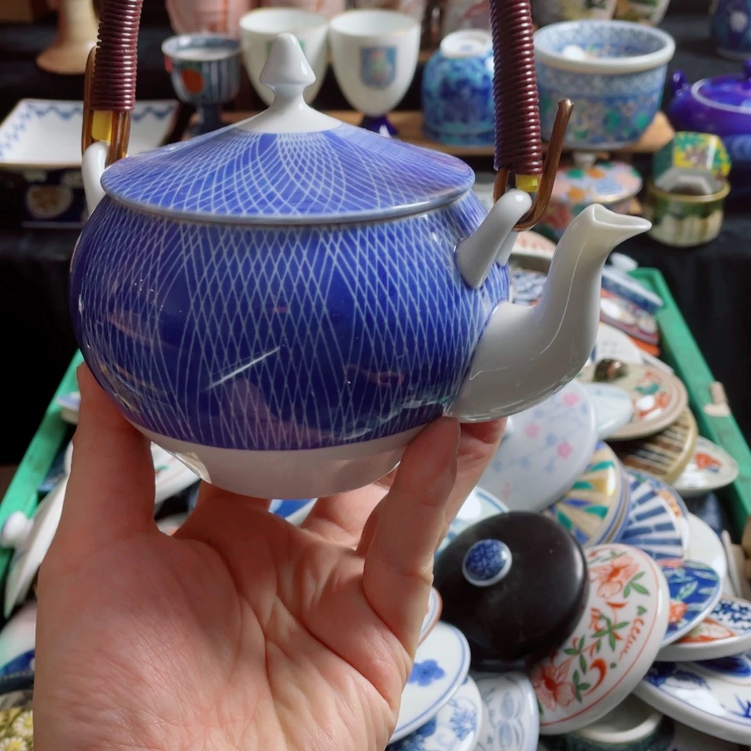 瓷片深川球扣提梁壶