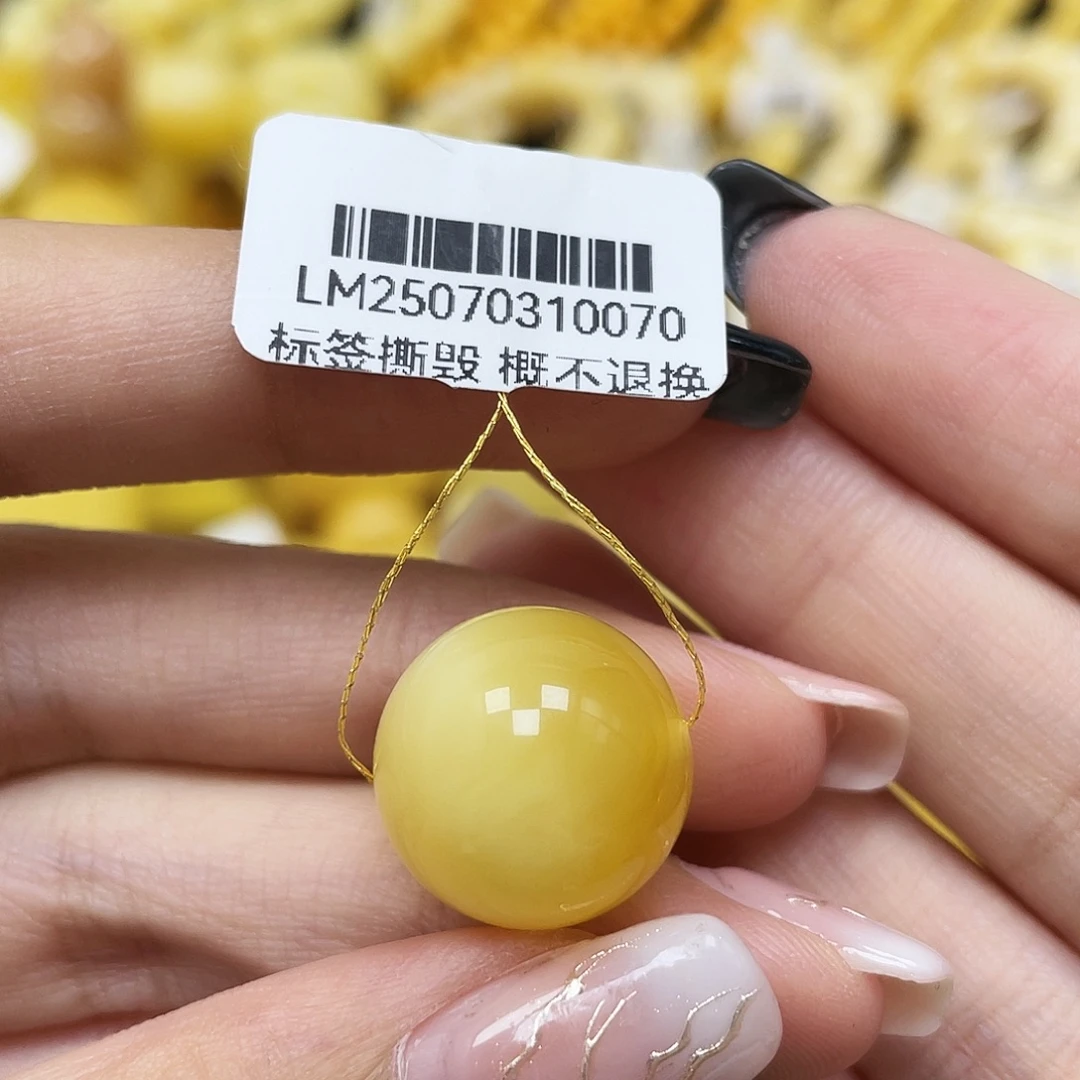 张***r琥珀未镶嵌裸石16.1mm圆珠蜜蜡