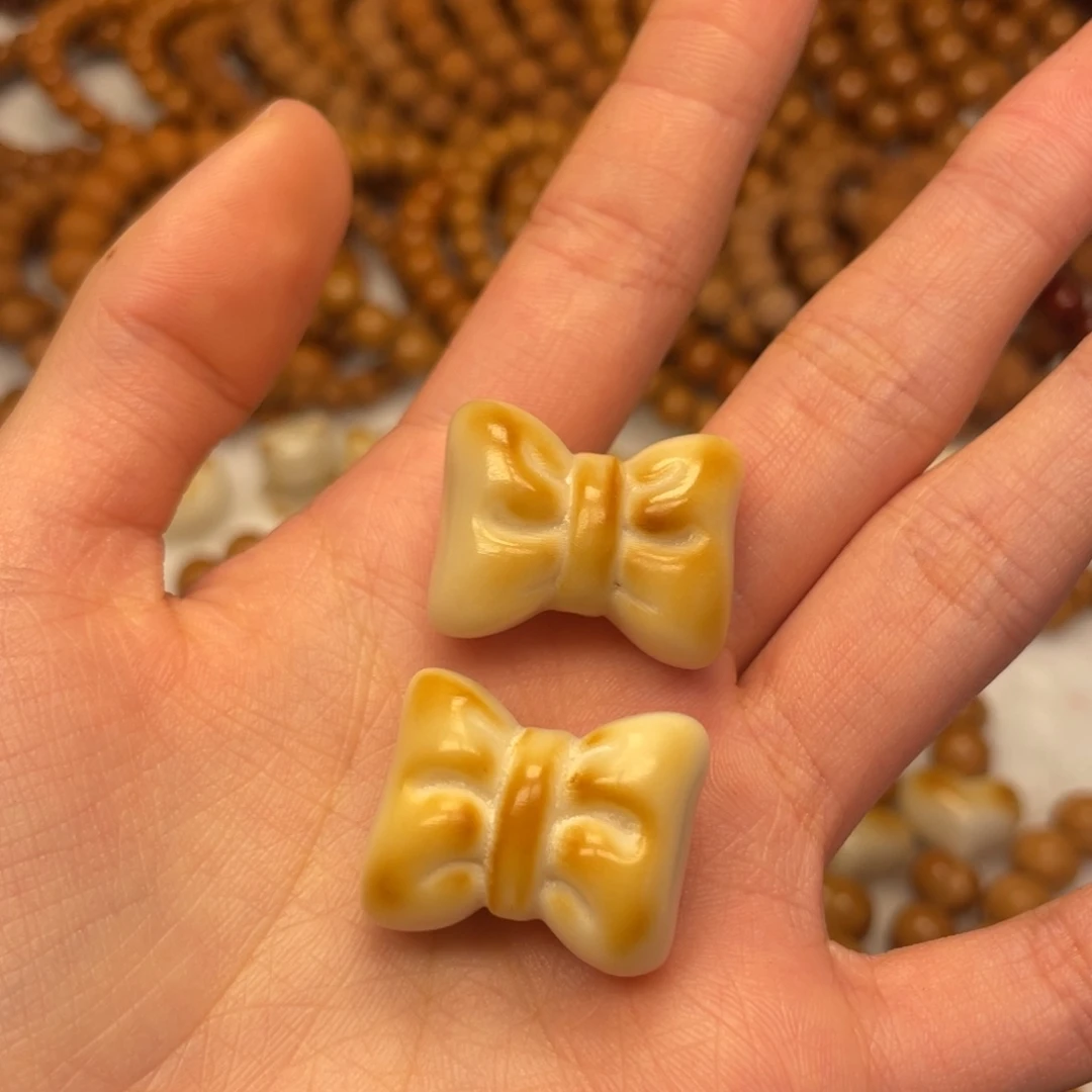 赵***赵配饰象牙果蝴蝶结两个