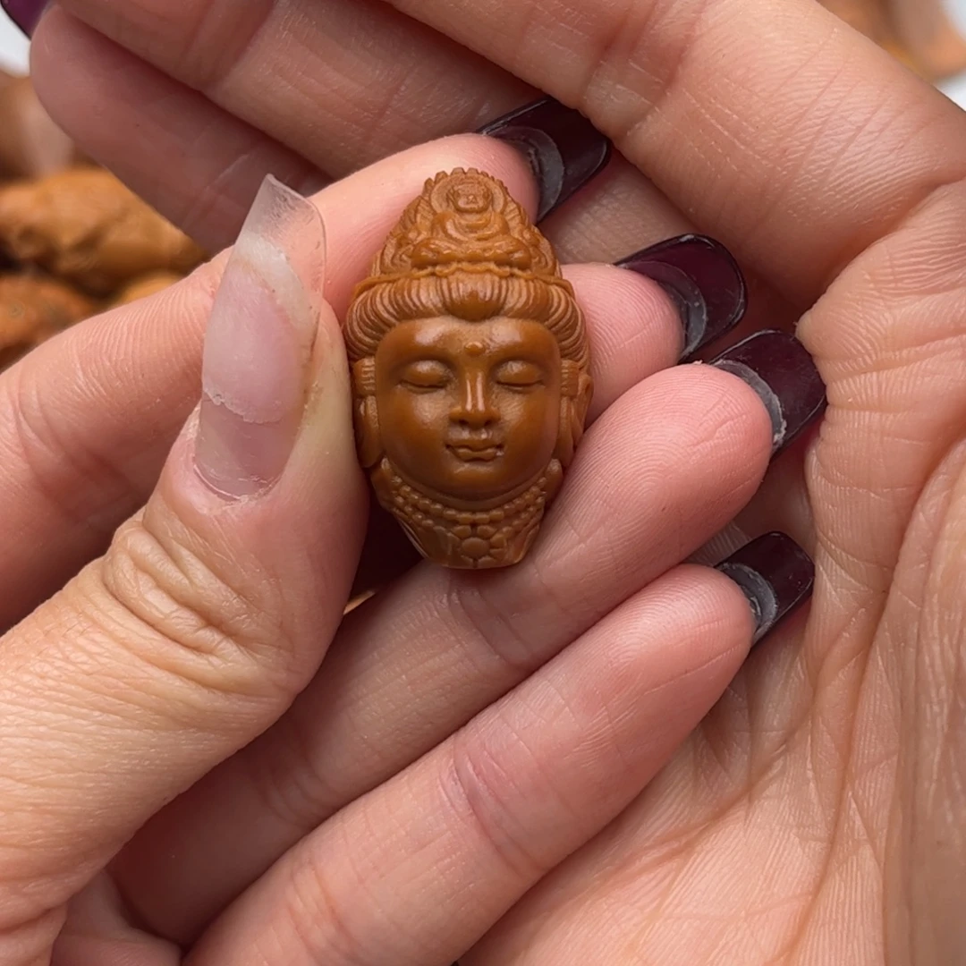 橄榄核吊坠观音头