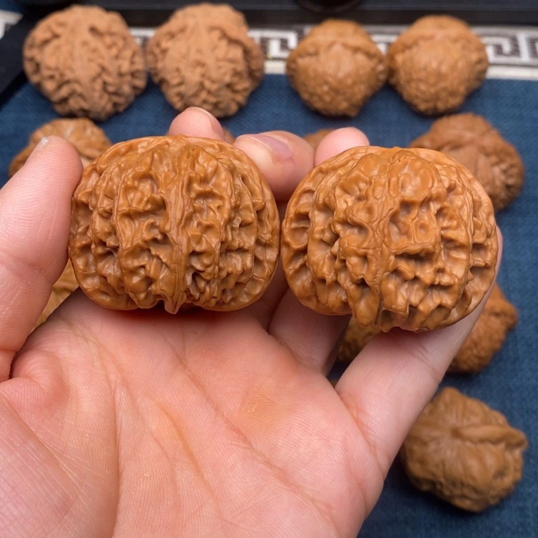 文玩核桃把件42红皮老树球苹果