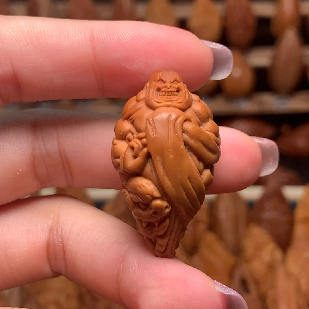 把件橄榄核强招恶僧