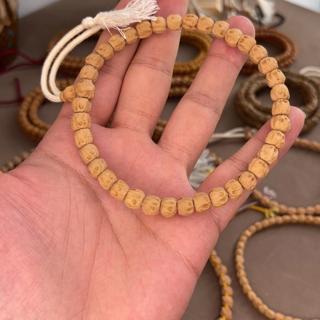 柏香籽/百香籽吊坠对眼鬼