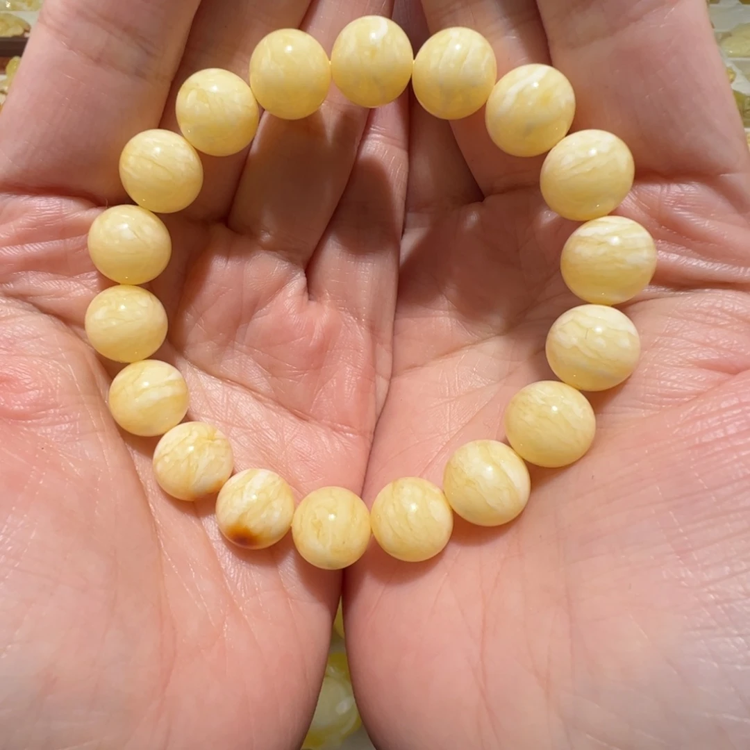 邱***邱琥珀未镶嵌裸石蜜蜡