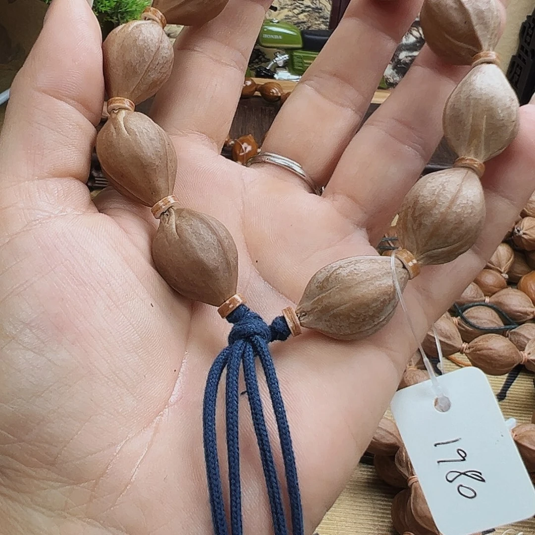 远***古橄榄核吊坠梅林铁核1624三面佛