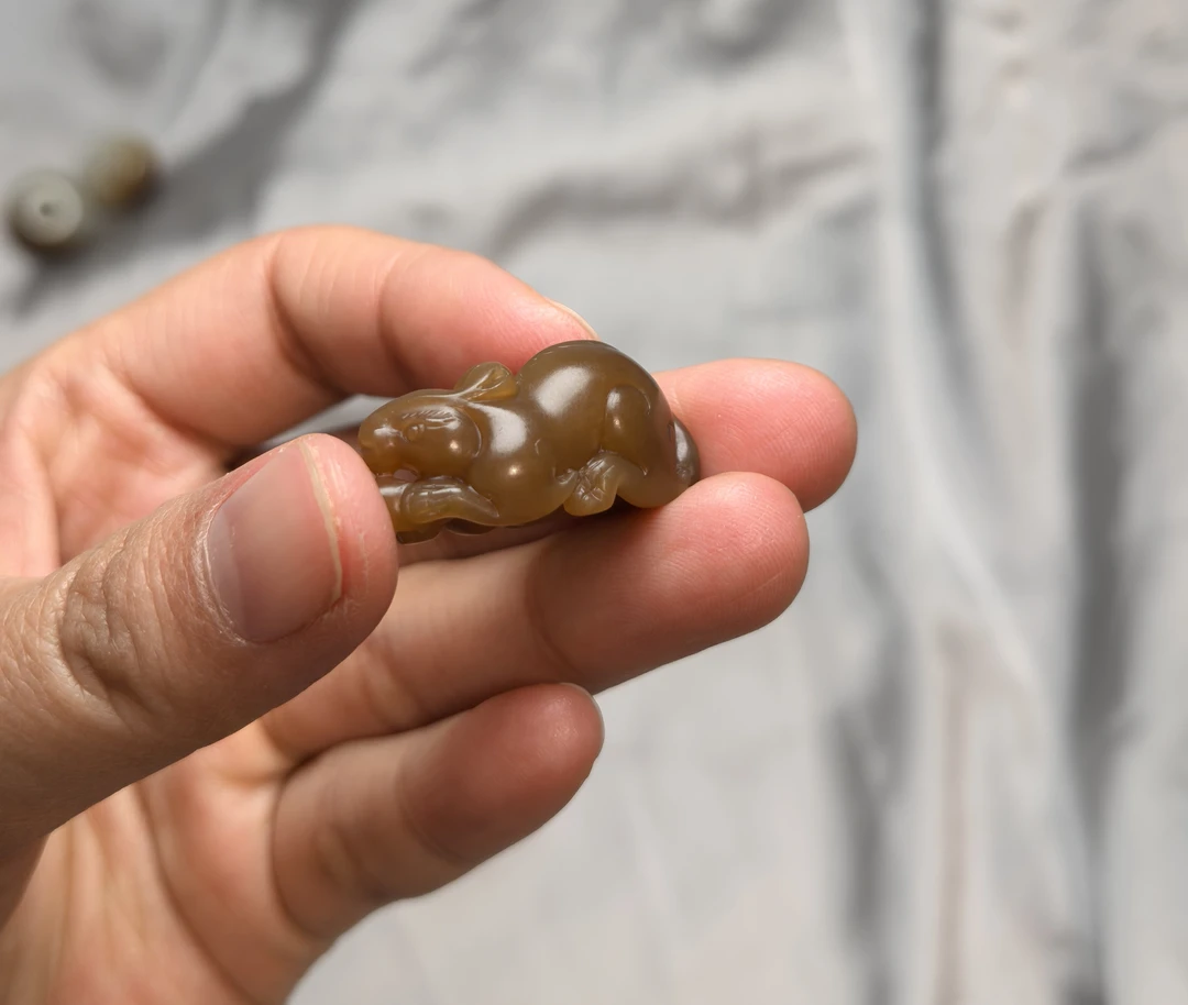 老鼠爱大米，新疆和田玉糖料，净重约8.91克，可可爱爱。