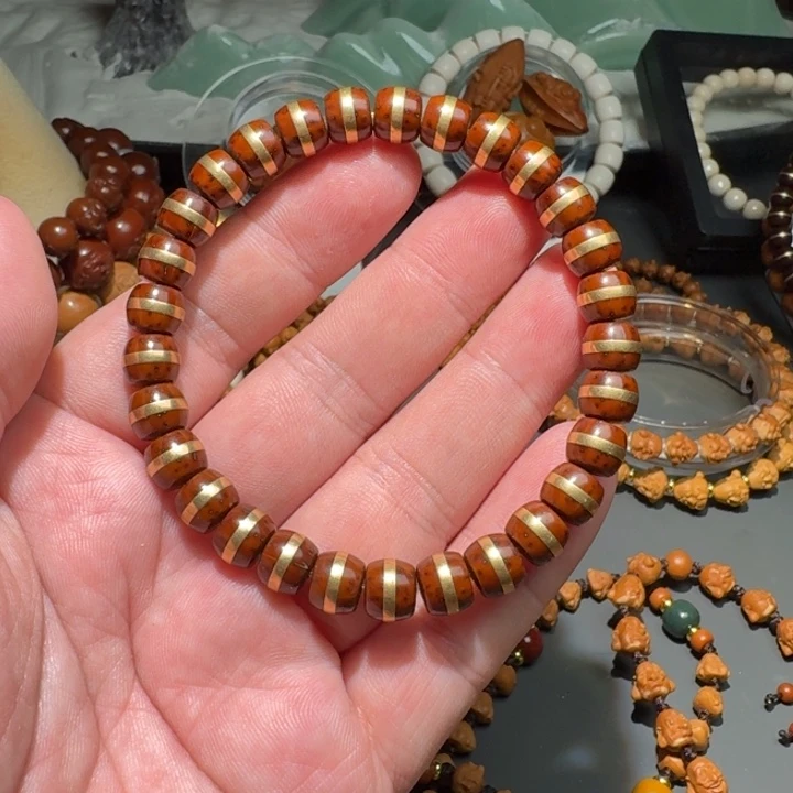 橄榄核手串哈****翼紫金鼠