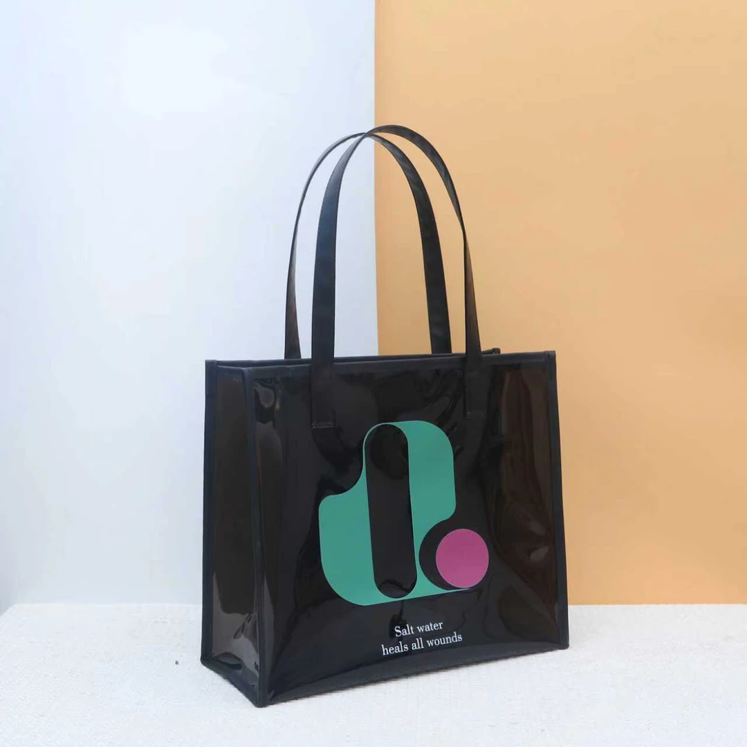 黑色手提Q字母秋冬防水包防水防污妈咪包手提包单肩包