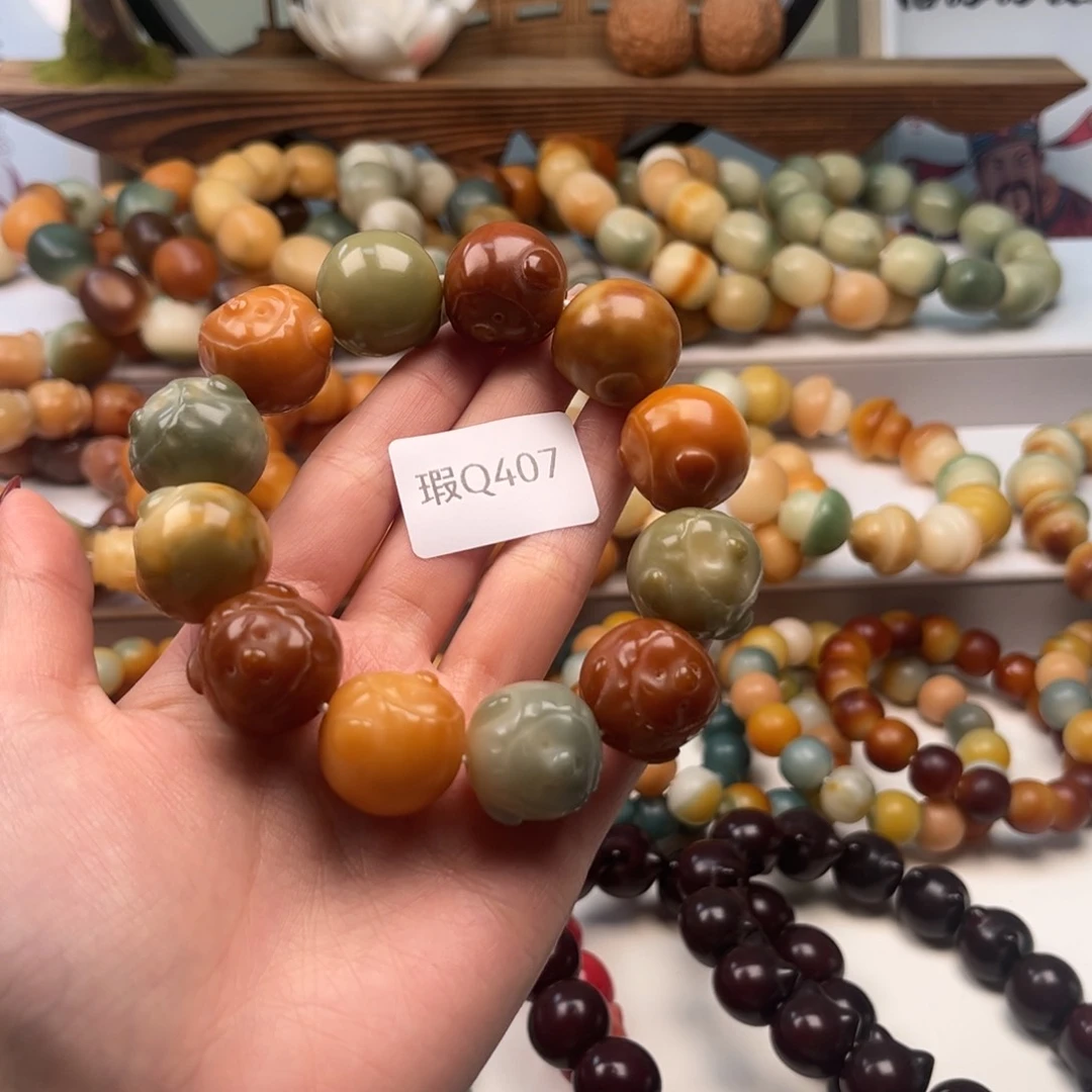 菩提根/象牙果手串大****?20mm瑕猪猪一串q407