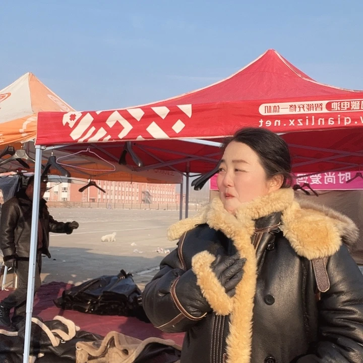 52码黑米色中长款皮毛一体