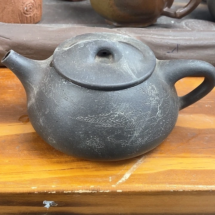 紫砂茶壶处理一把