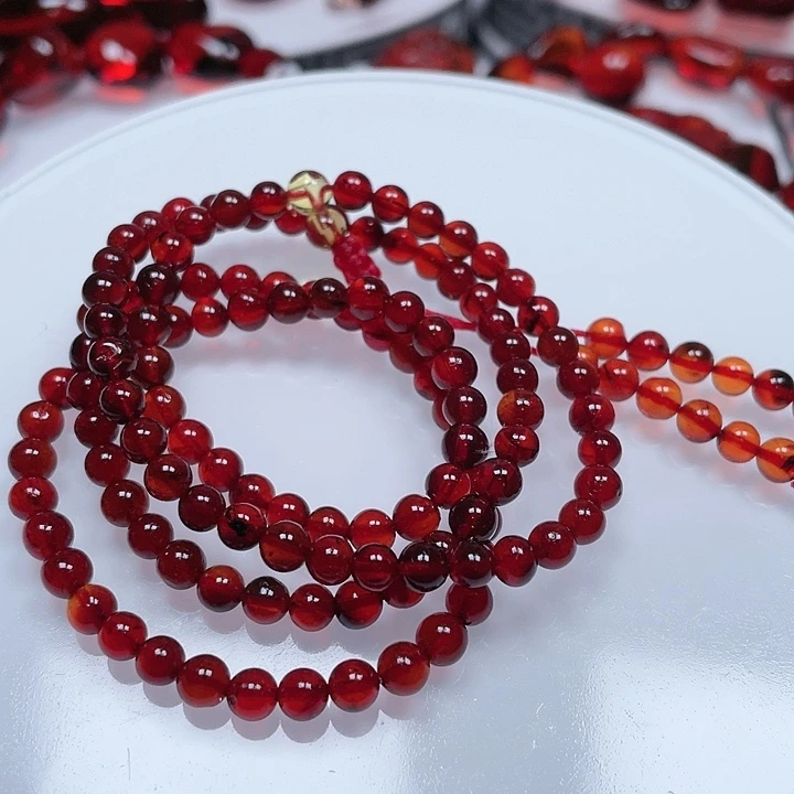 血珀手链未镶嵌艳**照规格4-5，有瑕疵