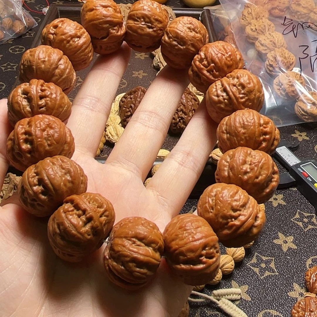 王***森核桃磨盘元宝手持88