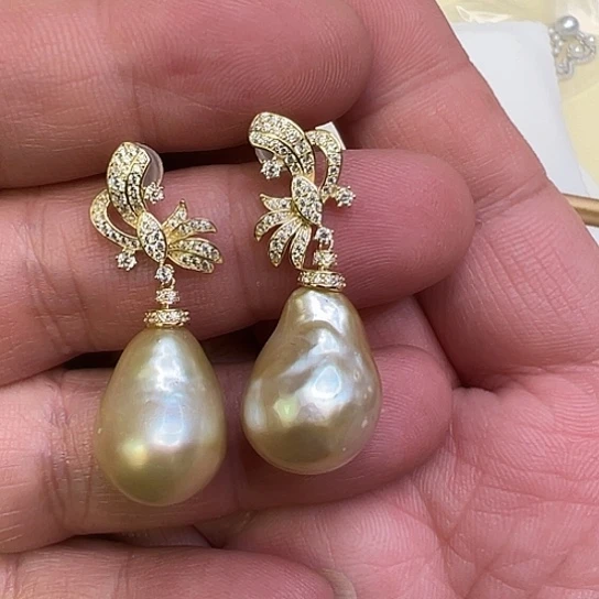 莱***子耳饰银S925镶嵌海水珍珠