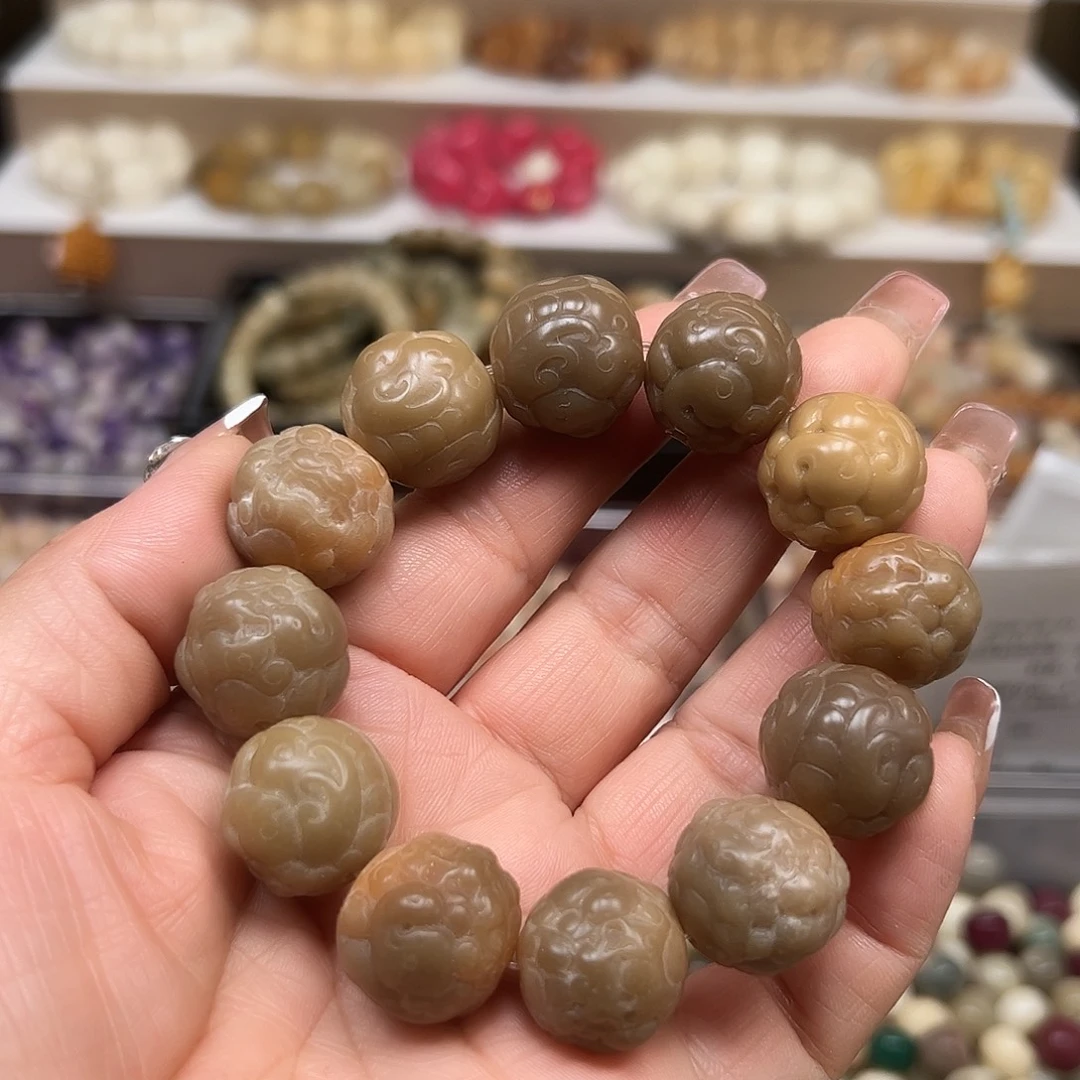 手串菩提根/象牙果瑕疵貔貅1条