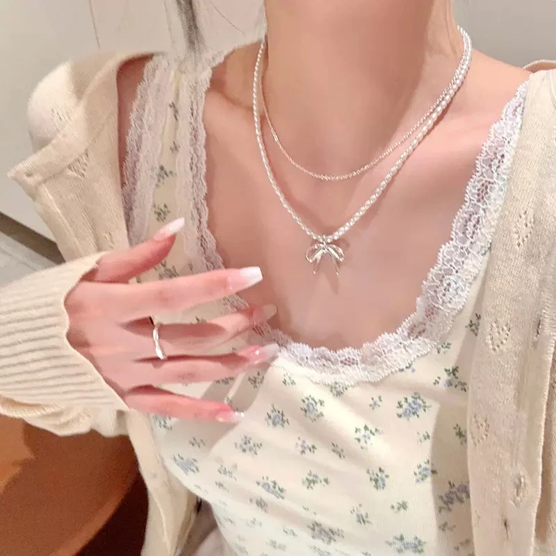 钛钢项链 小米珠双层叠带珍珠蝴蝶结项链女轻奢百搭高级感锁骨链