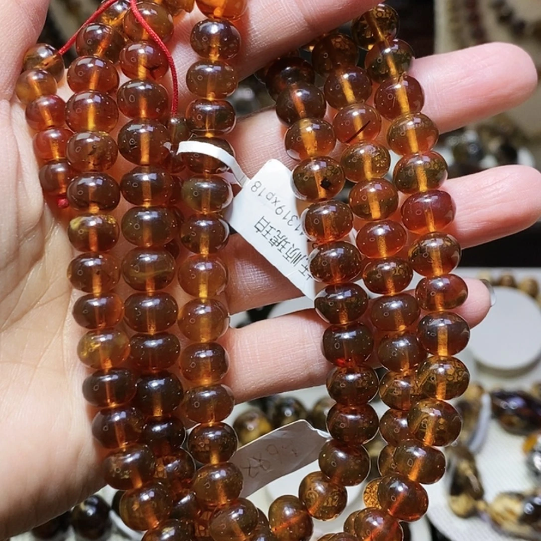 翳***哥琥珀未镶嵌裸石樱桃红9mm