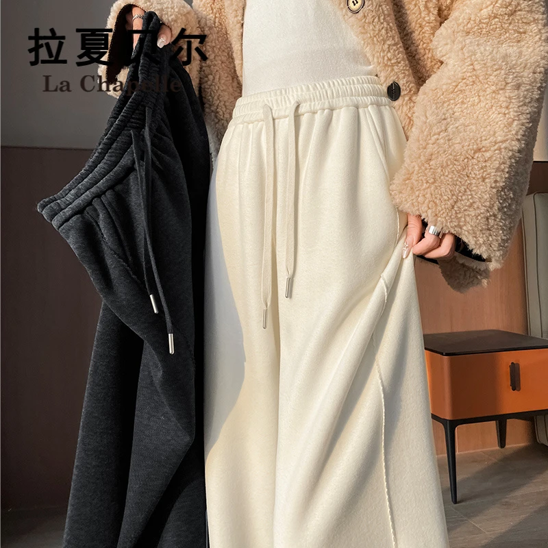 拉夏贝尔白色醋酸羊毛糯米裤女冬季2025新款加绒保暖休闲阔腿卫裤