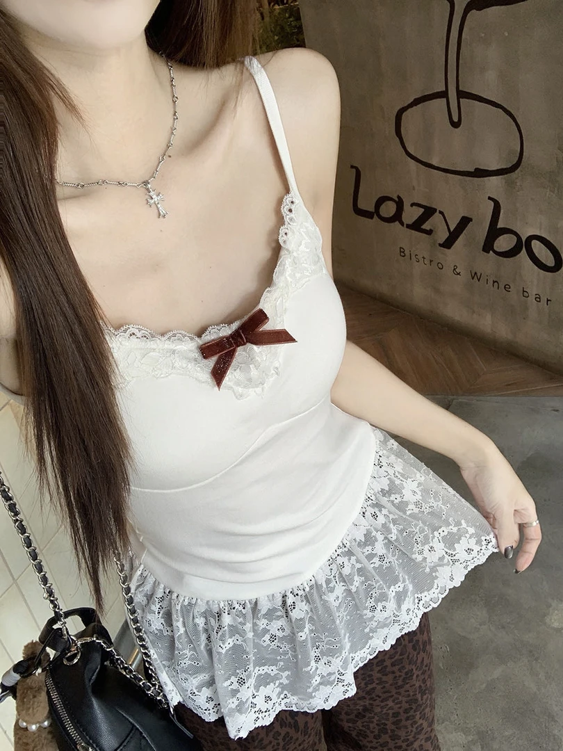 2025早春新款叠穿白色蕾丝吊带背心女气质百搭辣妹设计感裙摆上衣