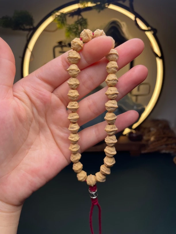 玉化皮果冻料石头籽大尺寸藏区百香籽手持