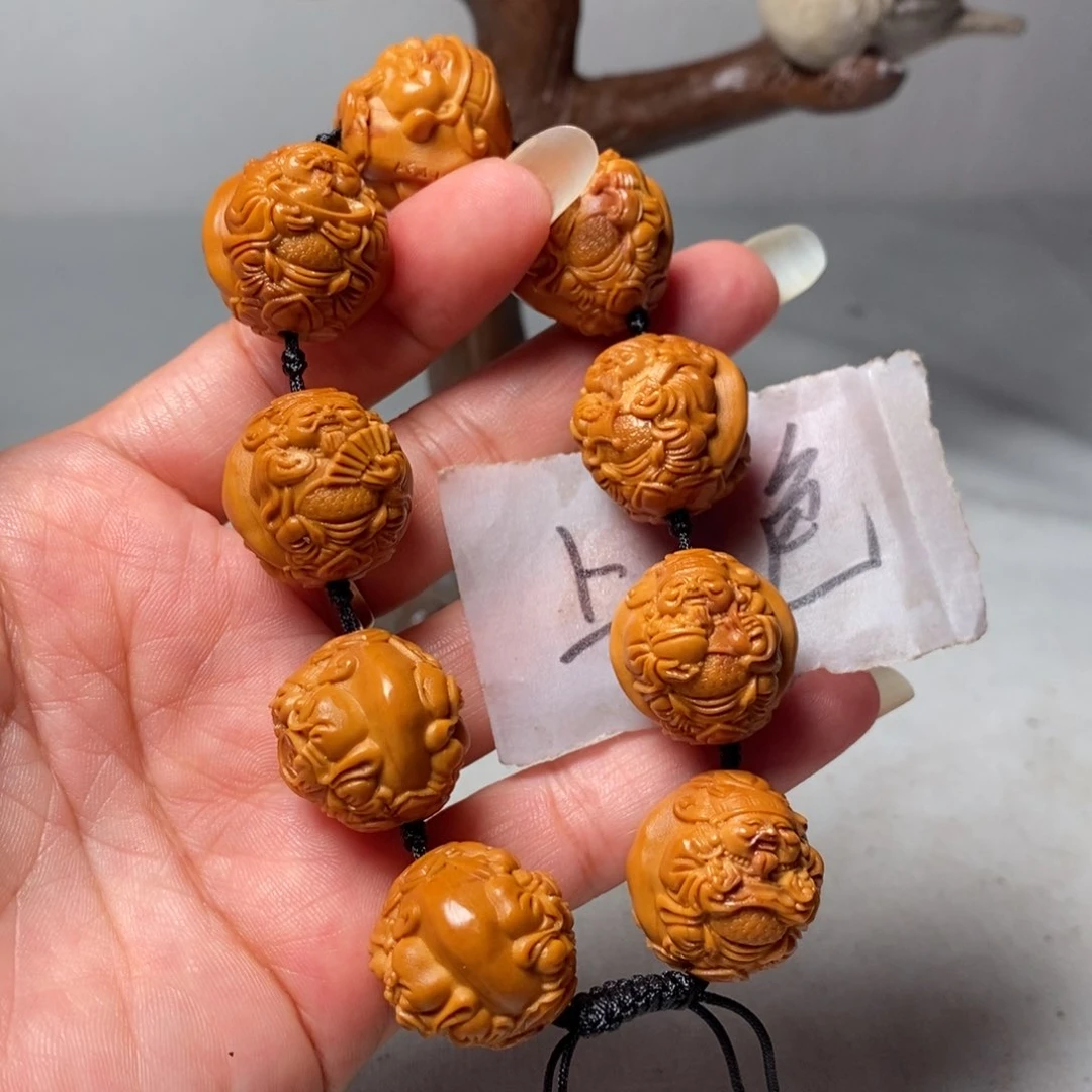 橄榄核吊坠财迷手串