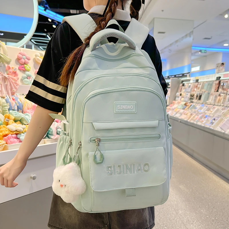 纯色刺绣新中式双根简约风双肩书包轻便小清新女减负